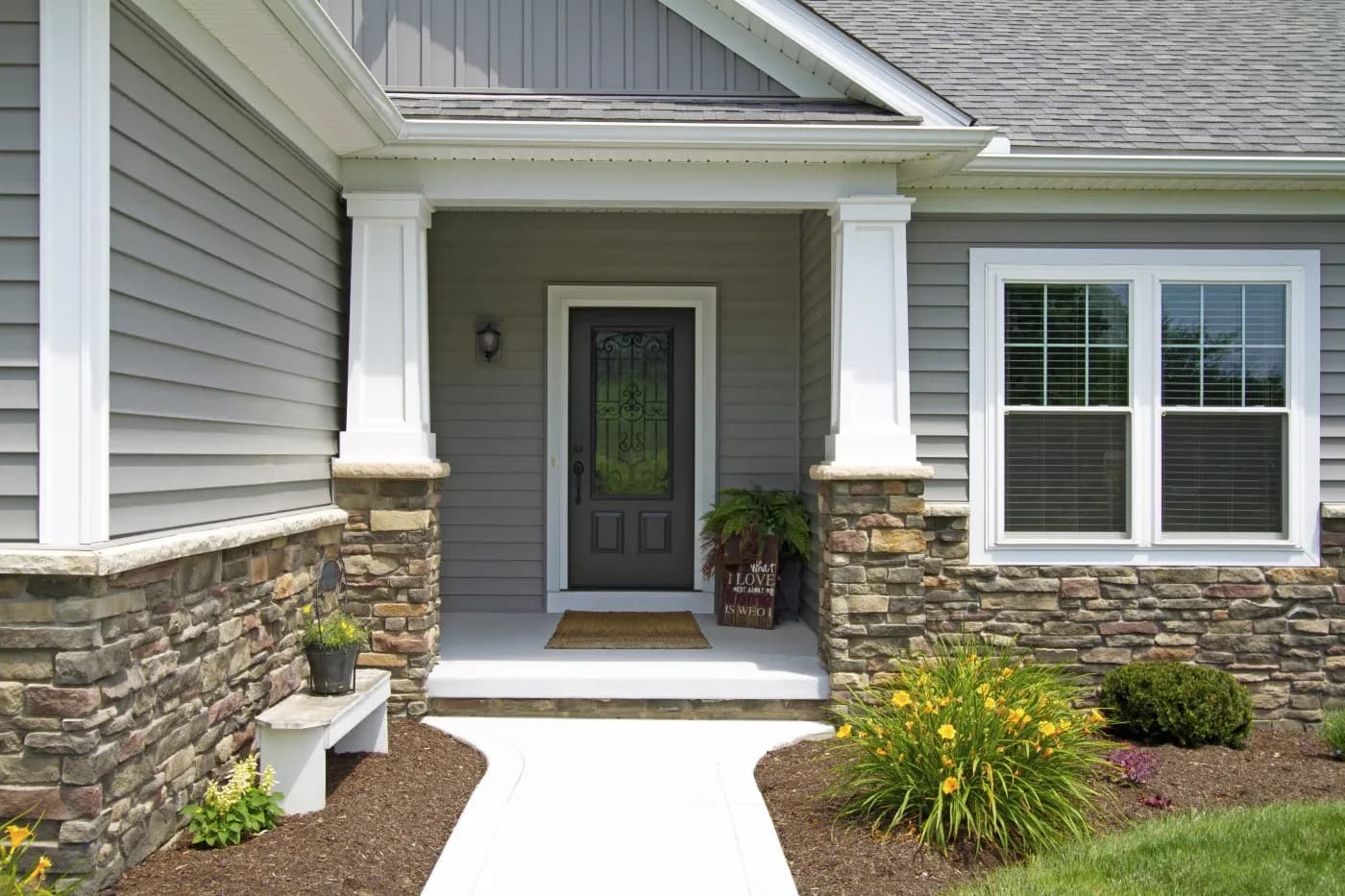 A simple black door with sidelights